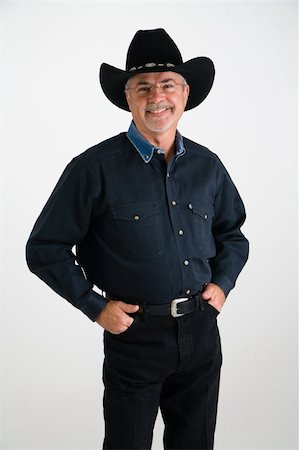 pblscooter (artist) - Smiling cowboy in all black clothes - happy and friendly Stock Photo - Budget Royalty-Free & Subscription, Code: 400-03916972