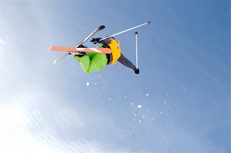 A freestyle skier doing a cork 720 on a backcountry jump at Valdresflya, Norway. Fotografie stock - Microstock e Abbonamento, Codice: 400-03917175