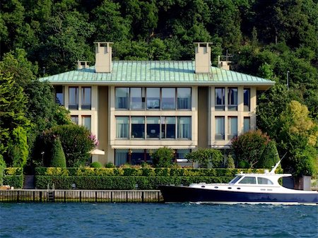 simsearch:400-04967673,k - Luxurious coast villa with beautiful motor yacht Stock Photo - Budget Royalty-Free & Subscription, Code: 400-03918448