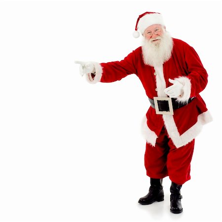simsearch:400-03919056,k - Santa Claus standing, full length, pointing to copy space, white background Photographie de stock - Aubaine LD & Abonnement, Code: 400-03919055