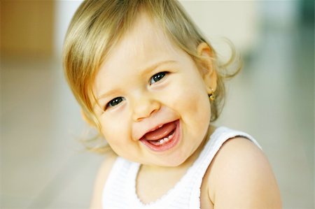 simsearch:400-04161658,k - Small baby is laughing Fotografie stock - Microstock e Abbonamento, Codice: 400-03919510