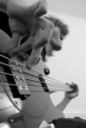 Black and white of Bass Guitar Player Fotografie stock - Microstock e Abbonamento, Codice: 400-03919746