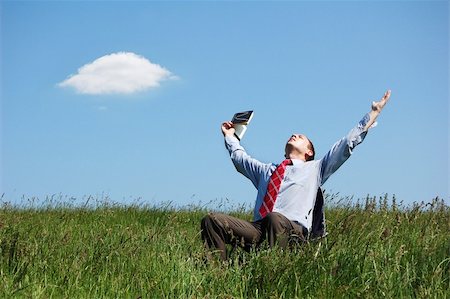 A man reading a book in the sunshine. Stock Photo - Budget Royalty-Free & Subscription, Code: 400-03919938