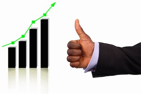 This is an image of a businessman's hand giving thumbs up, due to the rise on the graph. Fotografie stock - Microstock e Abbonamento, Codice: 400-03910789