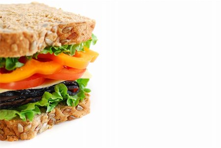 Big healthy sandwich with vegetables and meat close up on white background with copy space Foto de stock - Super Valor sin royalties y Suscripción, Código: 400-03910816
