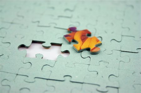 simsearch:700-03615616,k - Close up of a Jigsaw with elements missing Stockbilder - Microstock & Abonnement, Bildnummer: 400-03910841