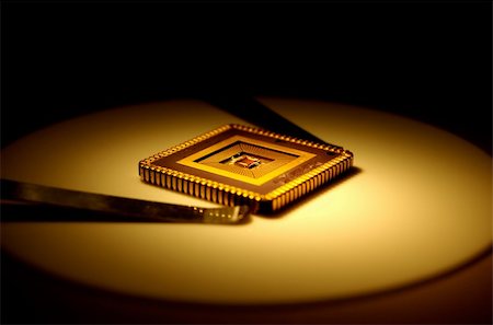 small copper - Extreme close-up of computer micro chip . Stock Photo - Budget Royalty-Free & Subscription, Code: 400-03911090