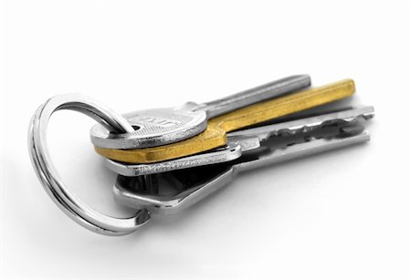 bunch of keys in grey and one golden key Foto de stock - Super Valor sin royalties y Suscripción, Código: 400-03911294