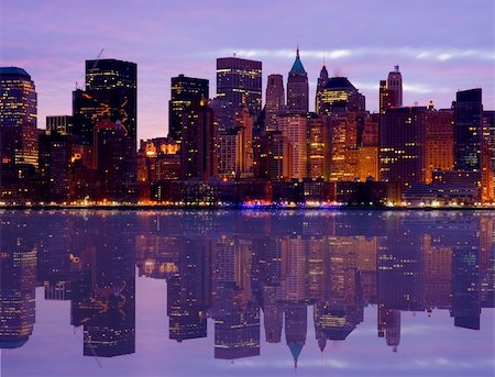 Early Morning Manhattan skyline with water reflection Stock Photo - Budget Royalty-Free & Subscription, Code: 400-03911323