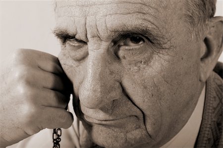 simsearch:400-03969432,k - portrait of serious old man looking strictly into the camera. Sepia Stock Photo - Budget Royalty-Free & Subscription, Code: 400-03911458