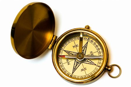 simsearch:400-07714543,k - Old style brass compass on white background Fotografie stock - Microstock e Abbonamento, Codice: 400-03911572
