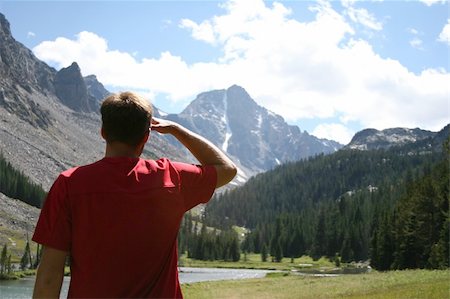 Day hiker catching a glimpse of Whitetail Peak, Montana. Stock Photo - Budget Royalty-Free & Subscription, Code: 400-03911583