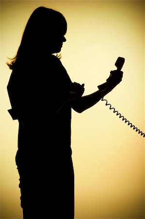 simsearch:400-04291703,k - isolated on gold silhouette of woman on the phone Stock Photo - Budget Royalty-Free & Subscription, Code: 400-03912009