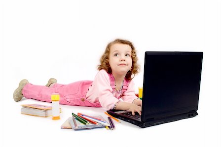 simsearch:400-04651437,k - little girl with computer, pencils, CD, school writing-materials around Stockbilder - Microstock & Abonnement, Bildnummer: 400-03912023