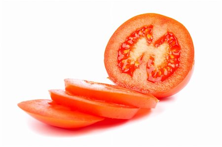 simsearch:400-03964348,k - Sliced tomatoes with shadow on white background. Shallow DOF Stockbilder - Microstock & Abonnement, Bildnummer: 400-03912054