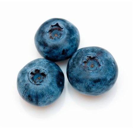 simsearch:614-05650791,k - Blueberry close up isolated on white Stock Photo - Budget Royalty-Free & Subscription, Code: 400-03912085