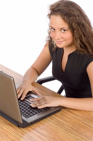 isolated on white female teenager at the laptop Stock Photo - Budget Royalty-Free & Subscription, Code: 400-03912222