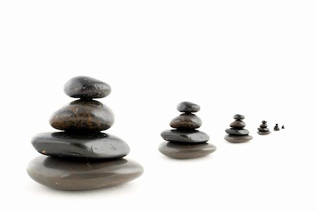 simsearch:633-02417737,k - Stacks of balanced stones with shadow on white background Fotografie stock - Microstock e Abbonamento, Codice: 400-03912284