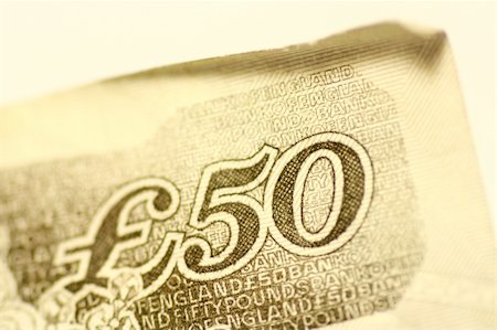 simsearch:622-06439352,k - Macro shot of a british pound note. Stock Photo - Budget Royalty-Free & Subscription, Code: 400-03912283