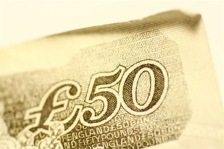 Macro shot of a british pound note. Photographie de stock - Aubaine LD & Abonnement, Code: 400-03912283