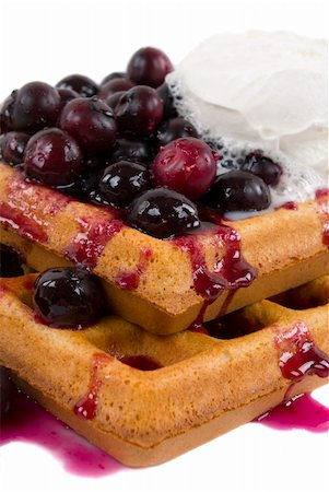 simsearch:400-09019412,k - Homemade whole wheat waffles with fresh blueberries, honey and cream Foto de stock - Super Valor sin royalties y Suscripción, Código: 400-03912522
