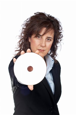 simsearch:400-03950272,k - Business woman holding a dvd disc over a white background. Focus on dvd disc Photographie de stock - Aubaine LD & Abonnement, Code: 400-03912557