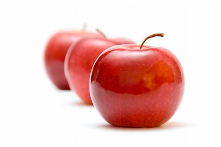 simsearch:859-06470145,k - three red apples against white background Stock Photo - Budget Royalty-Free & Subscription, Code: 400-03912609