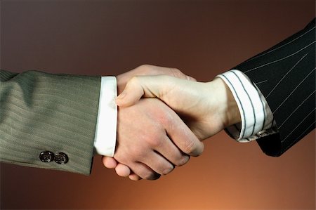 signing contract on computer - Business handshake Stock Photo - Budget Royalty-Free & Subscription, Code: 400-03912758