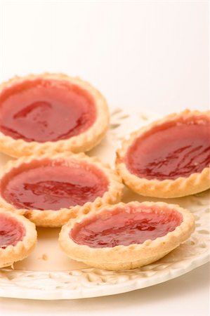simsearch:400-03915022,k - Strawberry Jam Tarts on a plate against a white background. Stock Photo - Budget Royalty-Free & Subscription, Code: 400-03912816