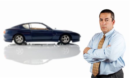 simsearch:400-04963726,k - Serious businessman who is in front of a car reflected in the bottom. Car blurred Stock Photo - Budget Royalty-Free & Subscription, Code: 400-03912877
