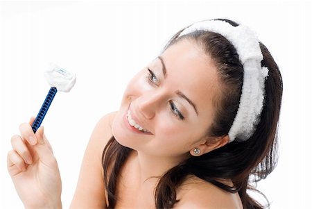 simsearch:400-08131957,k - cute and young brunette dressing white towel shaving her legs with foam and making face Stock Photo - Budget Royalty-Free & Subscription, Code: 400-03912892