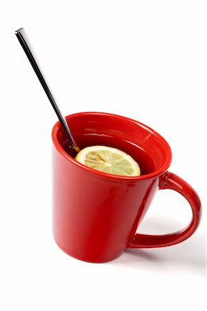 simsearch:622-06010012,k - A red cup of tea with one slice of lemon and the spoon inside. Soft shadow Stock Photo - Budget Royalty-Free & Subscription, Code: 400-03912919