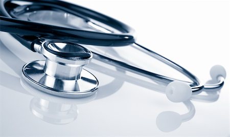 Stethoscope reflected on the background. Shallow DOF with selective focus on the front. Stock Photo - Budget Royalty-Free & Subscription, Code: 400-03912924