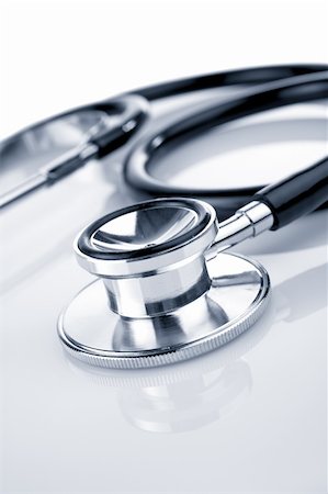 Stethoscope reflected on the background. Shallow DOF with selective focus on the front. Stock Photo - Budget Royalty-Free & Subscription, Code: 400-03912923