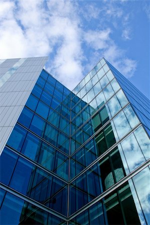 simsearch:400-04436949,k - Glass facade of business skyscraper with reflections Stock Photo - Budget Royalty-Free & Subscription, Code: 400-03913979