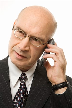 simsearch:400-03926822,k - Caucasian middle-aged businessman on cellphone against white background. Stock Photo - Budget Royalty-Free & Subscription, Code: 400-03924322
