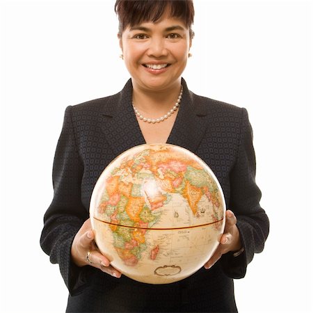 filipina businesswoman - Filipino middle-aged businesswoman holding globe in both hands standing in front of white background. Stock Photo - Budget Royalty-Free & Subscription, Code: 400-03924337