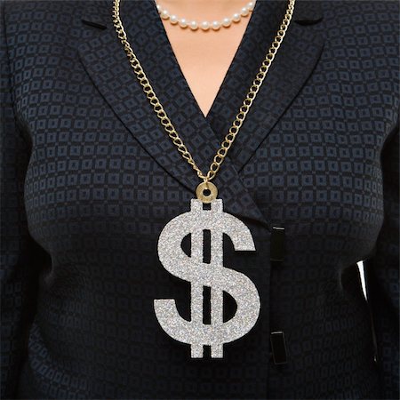 filipina businesswoman - Close-up of Filipino middle-aged businesswoman wearing chain necklace with oversized dollar sign. Stock Photo - Budget Royalty-Free & Subscription, Code: 400-03924351