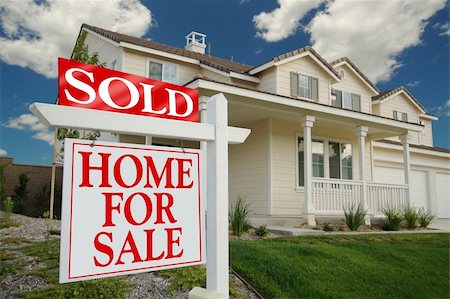 family with sold sign - Sold Home For Sale Sign in front of Beautiful New Home. Stock Photo - Budget Royalty-Free & Subscription, Code: 400-03924621