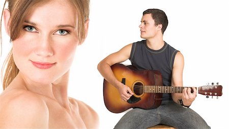 Close-up of the face of a beautiful brunette woman isolated on white. Young man in jeans and a t-shirt playing guitar and singing a song. Possibly lovers, implied nudity Stock Photo - Budget Royalty-Free & Subscription, Code: 400-03924806