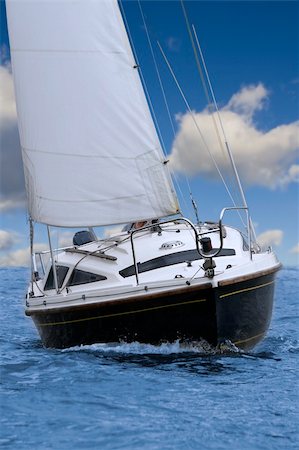 Closeup of little sailing yacht, front view. Stock Photo - Budget Royalty-Free & Subscription, Code: 400-03925054