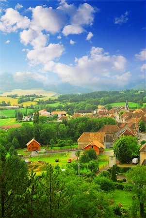 simsearch:400-03931546,k - Rural landscape with hills and a small village in eastern France Foto de stock - Royalty-Free Super Valor e Assinatura, Número: 400-03925117