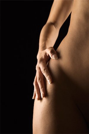simsearch:400-03925003,k - Nude Hispanic mid adult female hand on hip. Photographie de stock - Aubaine LD & Abonnement, Code: 400-03925136