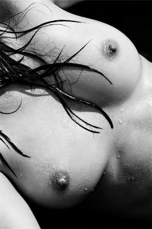 simsearch:400-03925003,k - Close up of nude Caucasian mid adult womans breasts. Photographie de stock - Aubaine LD & Abonnement, Code: 400-03925147