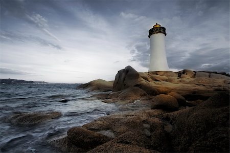 simsearch:400-04515946,k - lighthouse seen from a tiny beach in Sardinia. Foto de stock - Super Valor sin royalties y Suscripción, Código: 400-03925853