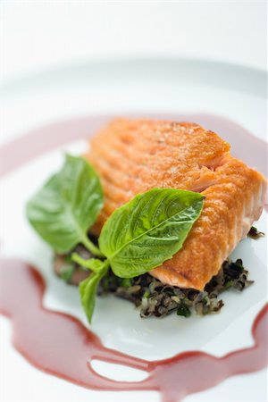 simsearch:632-08886774,k - Still life of gourmet salmon meal with professional presentation. Stockbilder - Microstock & Abonnement, Bildnummer: 400-03926017