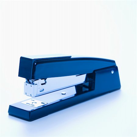 simsearch:400-03926032,k - Blue stapler on white background. Stock Photo - Budget Royalty-Free & Subscription, Code: 400-03926028
