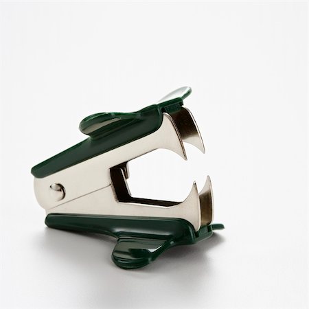 simsearch:400-03926032,k - Staple remover on white background. Stock Photo - Budget Royalty-Free & Subscription, Code: 400-03926040