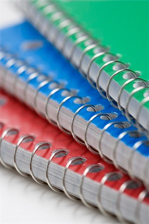 simsearch:400-03926032,k - Close up of three spiral bound notebooks stacked up. Stock Photo - Budget Royalty-Free & Subscription, Code: 400-03926054