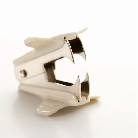 simsearch:400-03926032,k - Staple remover on white background. Stock Photo - Budget Royalty-Free & Subscription, Code: 400-03926087